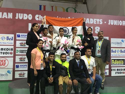 Junior Medalists with Coaches